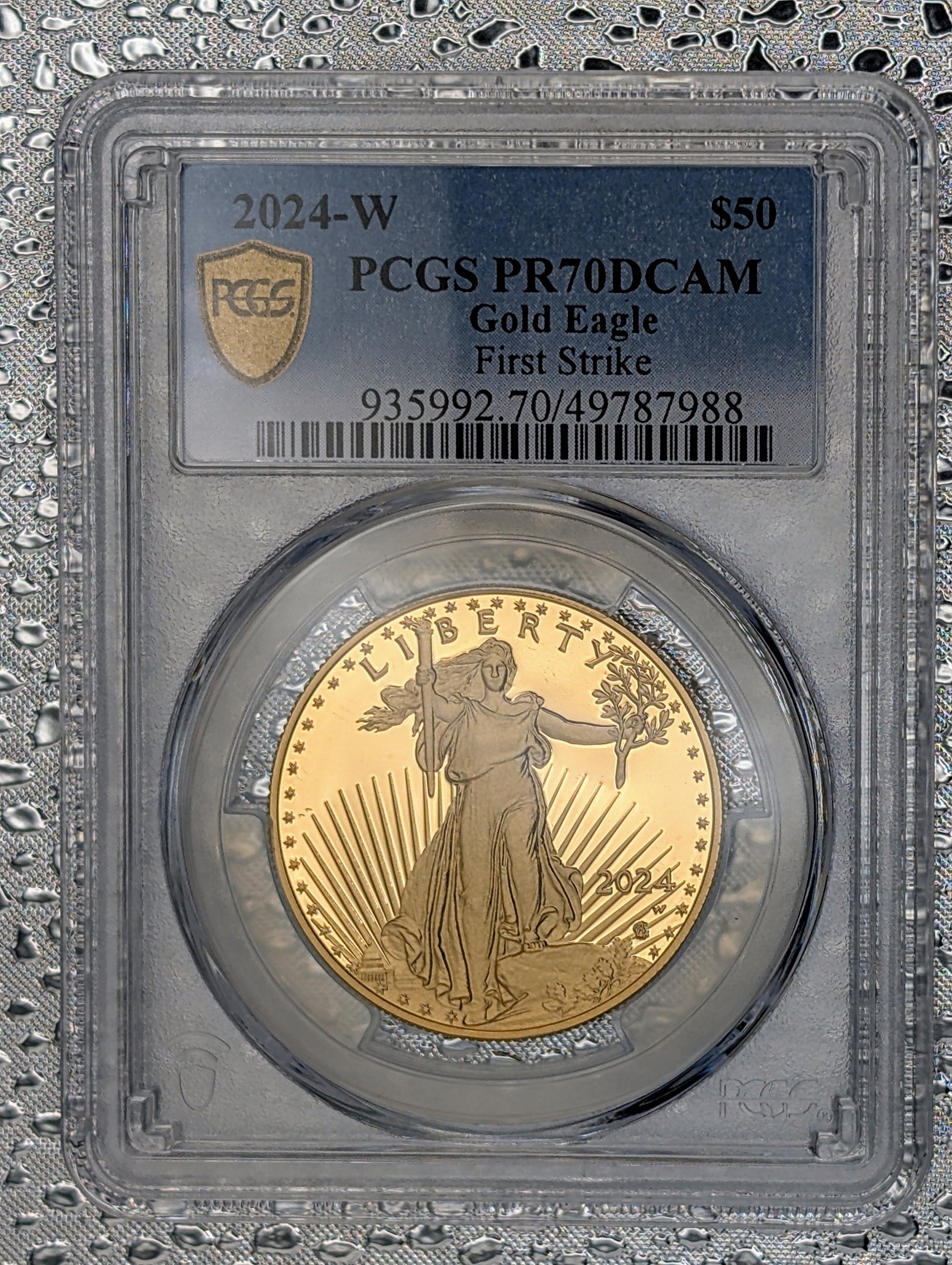 Front view of PR70DCAM PCGS graded 2024-W American Eagle 1 oz Gold Proof Coin showcasing exceptional detail.