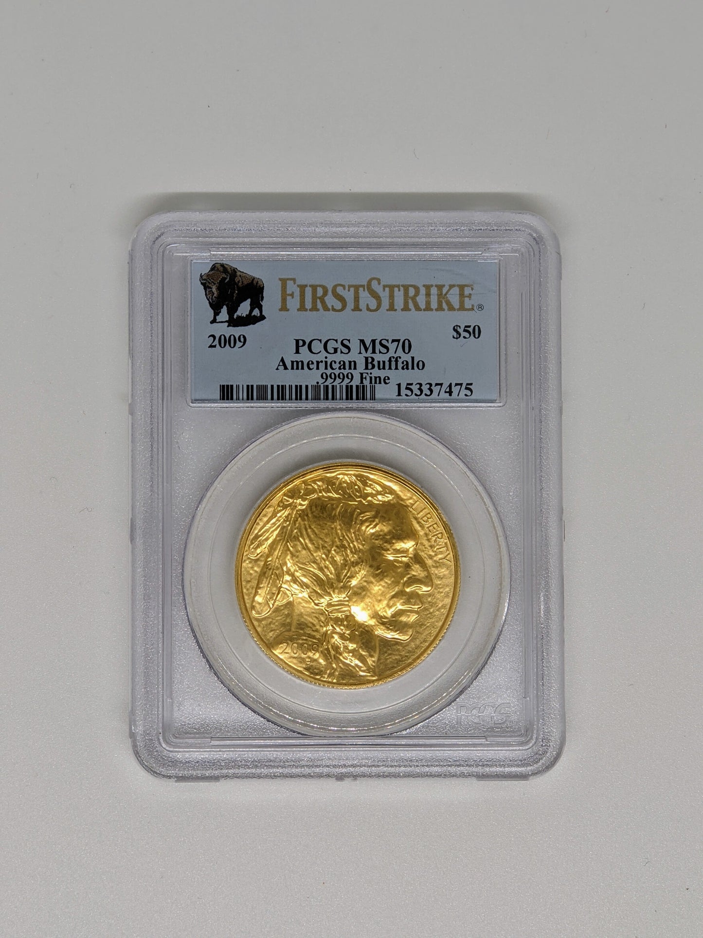 Front view of the 2009 $50 1 oz. Gold Buffalo Coin, graded MS70 by NGC. This coin's grade ensures its perfect condition for investors.